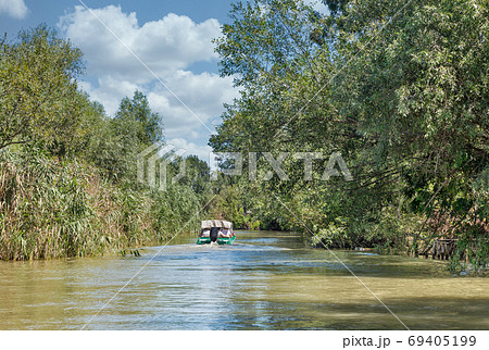 Danube biosphere reserve Ankudinovo river summer landscape. Vilkove, Ukraine. Danube biosphere reserve Ankudinovo river summer landscape. Vilkove, Ukraine. 69405199
