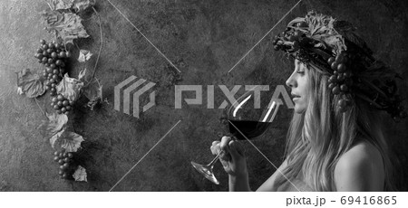 Portrait of beautiful caucasian blonde woman with glass of red Portrait of beautiful caucasian blonde woman with glass of red 69416865