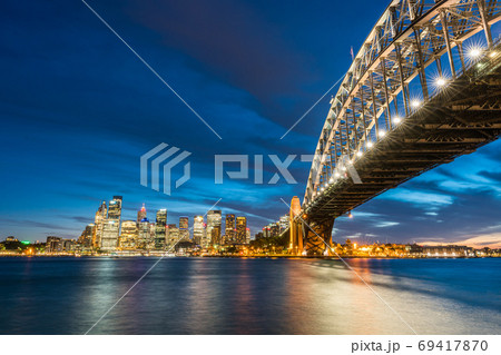 Sydney downtown skyline with harbor bridge at night in Sydney, Australia 69417870
