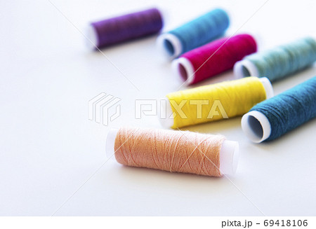 Spools of thread on a white Spools of thread on a white 69418106
