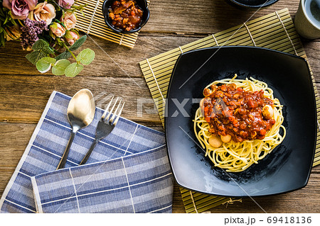 Spaghetti pasta with sausage and tomato sauce 69418136
