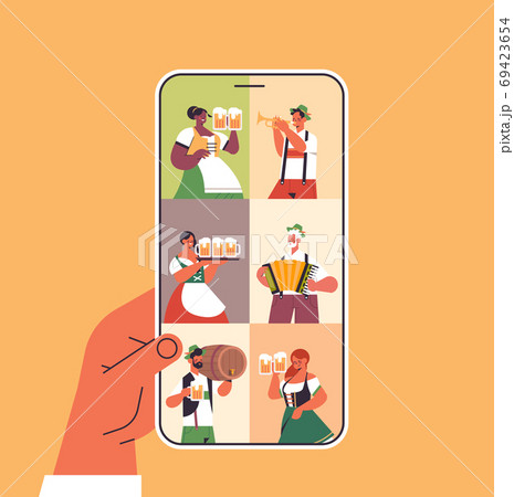 people on smartphone screen celebrating Oktoberfest party beer festival online communication concept 69423654