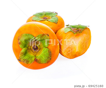 persimmon on white background persimmon on white background 69425160