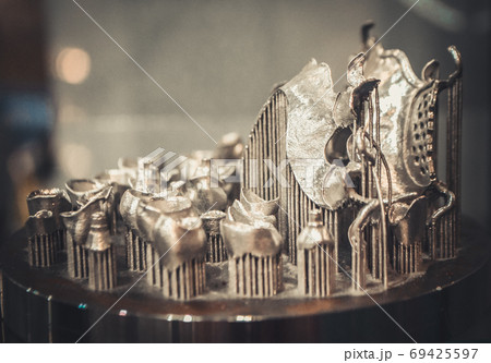 Object printed on metal 3d printer close-up. 69425597