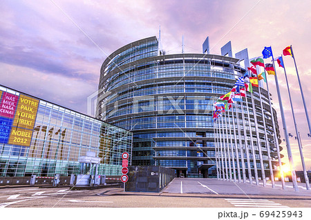 STRASBOURG, 25 December 2012 - Sunrise on the European parliament building promoting its Nobel price panels in Strasbourg, France STRASBOURG, 25 December 2012 - Sunrise on the European parliament building promoting its Nobel price panels in Strasbourg, France 69425943
