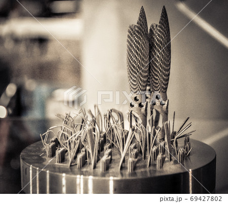 Object printed on metal 3d printer close-up. Object printed on metal 3d printer close-up. 69427802
