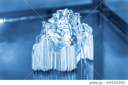 Object printed on metal 3d printer close-up Object printed on metal 3d printer close-up 69428360