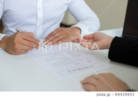 Managers or HR departments read resume and interview applicants for selection as a company real estate agent, Employment and selection of new staff representatives concept. Managers or HR departments read resume and interview applicants for selection as a company real estate agent, Employment and selection of new staff representatives concept. 69429955