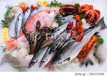 Fresh seafood on ice background. Fresh seafood on ice background. 69433009