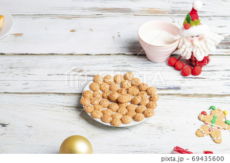 Cookies and milk for Santa Claus. 69435600
