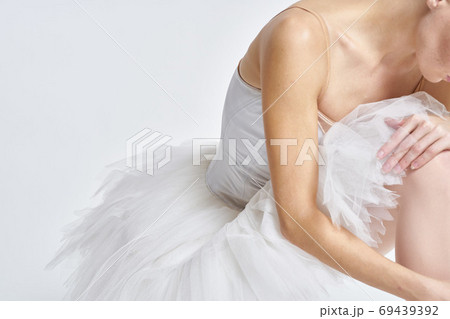 Ballerina in white tutu elegant dance performed sensuality silhouette light background Ballerina in white tutu elegant dance performed sensuality silhouette light background 69439392