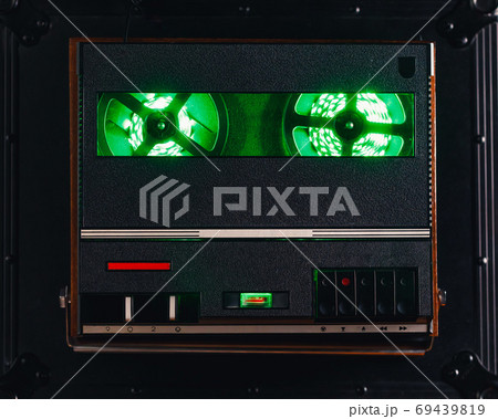 reel to reel audio tape recorder with green led light strip. VU meter with "Recording" title 69439819