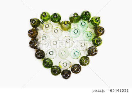 empty wine bottles heart shape, white background empty wine bottles heart shape, white background 69441031