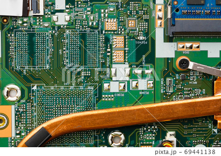 printed circuit board (pcb) of an laptop, electronics background printed circuit board (pcb) of an laptop, electronics background 69441138