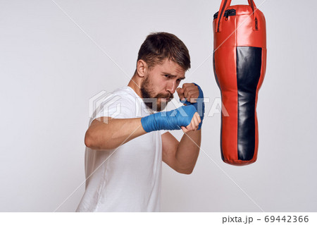 Sports car punching bag bandages on the hands of the exercise 69442366
