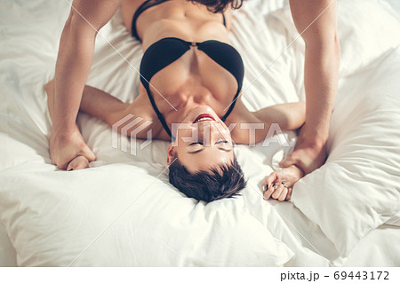 Top view of tender woman, man is above Top view of tender woman, man is above 69443172