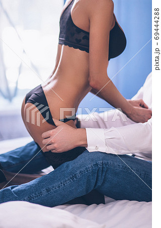 Side profile cropped close up photo of couple about to have sex Side profile cropped close up photo of couple about to have sex 69444288