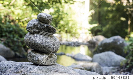 Closeup of stone balance in border river Closeup of stone balance in border river 69448881