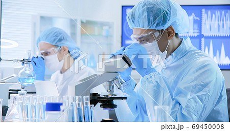 Asian scientist take petri dish Asian scientist take petri dish 69450008