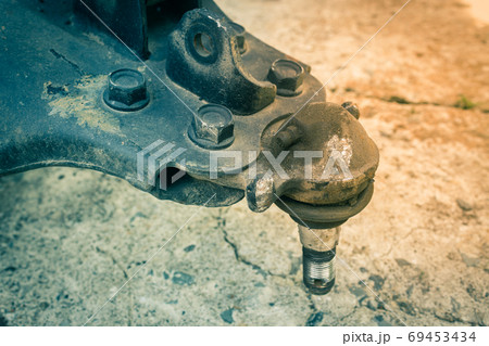 Zoom View Old Auto Part Lower Arm Ball Joint of Car in Vintage Tone Zoom View Old Auto Part Lower Arm Ball Joint of Car in Vintage Tone 69453434