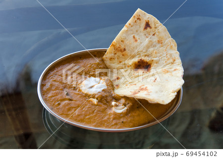 paneer  and cheese curry , indian food  in  metal bowl 69454102