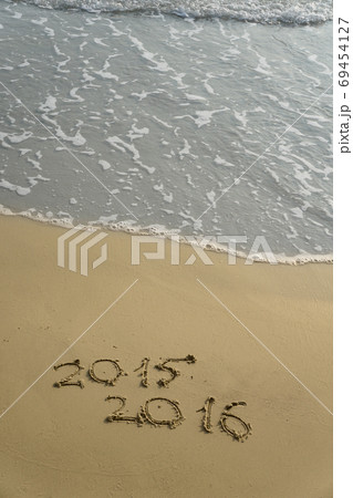 2015 and 2016 year on the sand beach 69454127