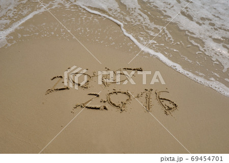 2015 and 2016 year on the sand beach 69454701