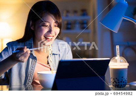 woman watch video on tablet woman watch video on tablet 69454982