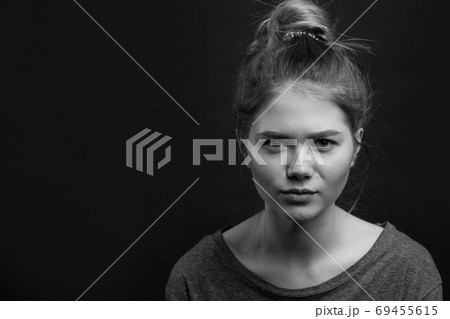 Depressed sad young woman having some problems isolated 69455615