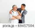 Senior Father With Adult Son isolated on white background 69457504