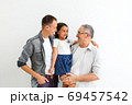 Indian asian family sitting over white background 69457542
