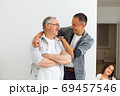 Senior Father With Adult Son isolated on white background 69457546