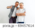 Senior Father With Adult Son isolated on white background 69457614