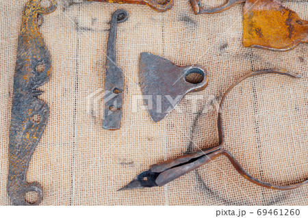 Blacksmith tools for forging metal and working with fire Blacksmith tools for forging metal and working with fire 69461260