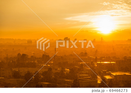 Cityscape with sunset in big city Cityscape with sunset in big city 69466273