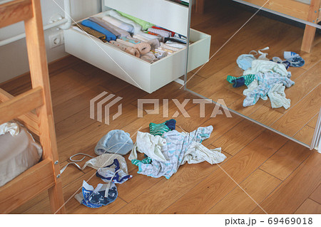 Storage in wardrobe. Preparing for the birth of a child. 69469018