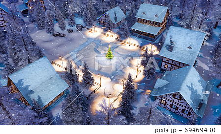 Alpine village at snowy Christmas night top view 69469430