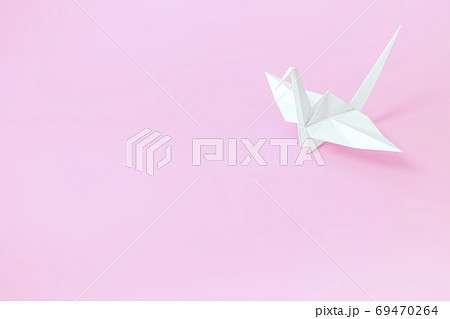 Origami Bird, bird paper crane on yellow background 3d rendering. 3d illustration bird paper craft for Hiroshima remembrance day minimal style concept. 69470264