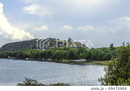 View of the hill on the peninsula of lake Sevan and the 9th century medieval monastery of Sevanavank in the Gegharkunik region of Armenia View of the hill on the peninsula of lake Sevan and the 9th century medieval monastery of Sevanavank in the Gegharkunik region of Armenia 69470968