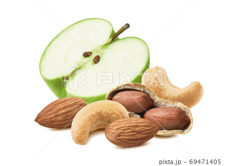 Half of green apple, cashew, almonds and peanuts isolated on whi Half of green apple, cashew, almonds and peanuts isolated on whi 69471405