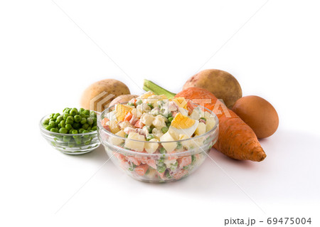 Traditional Russian salad in bowl. Olivier salad isolated on white background	 69475004