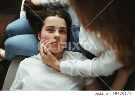 Girlfriends in love sharing time together indoors 69476179