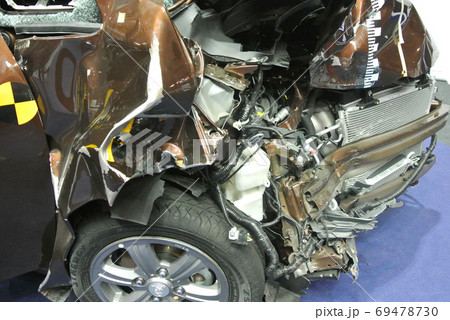 KUALA LUMPUR, MALAYSIA -NOVEMBER 11, 2017: The front of the car is badly damaged by road accidents. KUALA LUMPUR, MALAYSIA -NOVEMBER 11, 2017: The front of the car is badly damaged by road accidents. 69478730