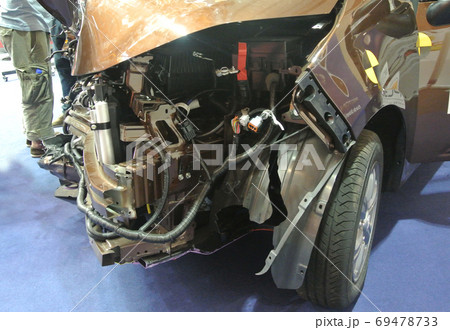KUALA LUMPUR, MALAYSIA -NOVEMBER 11, 2017: The front of the car is badly damaged by road accidents. KUALA LUMPUR, MALAYSIA -NOVEMBER 11, 2017: The front of the car is badly damaged by road accidents. 69478733