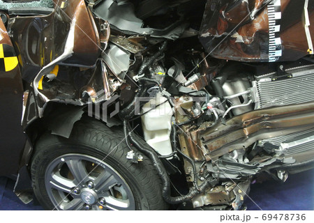 KUALA LUMPUR, MALAYSIA -NOVEMBER 11, 2017: The front of the car is badly damaged by road accidents. KUALA LUMPUR, MALAYSIA -NOVEMBER 11, 2017: The front of the car is badly damaged by road accidents. 69478736