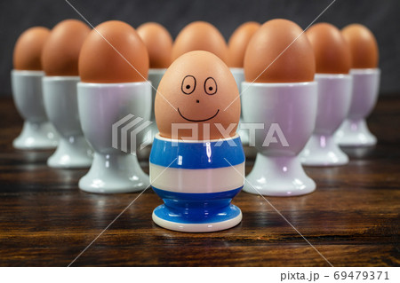 Happy Different Individual Concept Eggs in Egg Cups 69479371