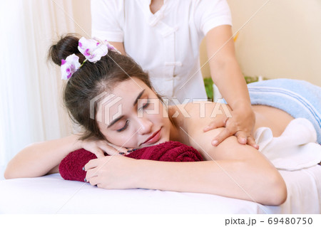 Close up of young woman wear towel relaxation for body and head 69480750