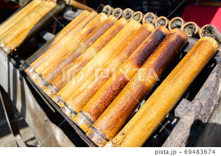 rice cooked in bamboo tubes 69483674