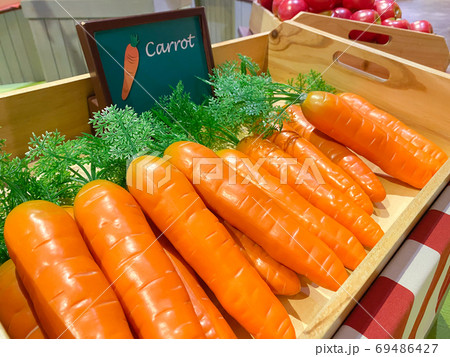 Artificial orange carrot. 69486427