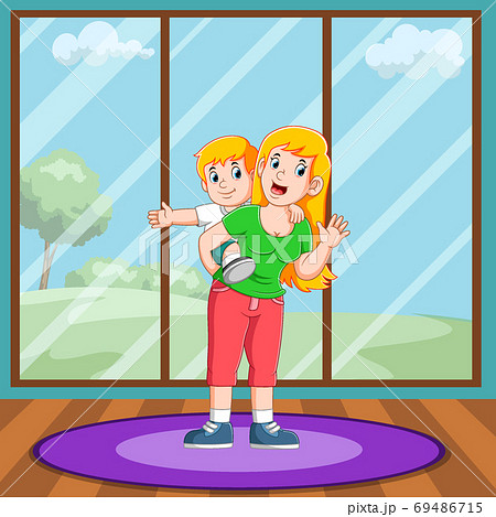 The boy is playing with his mother The boy is playing with his mother 69486715